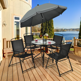 Small patio table with deals umbrella and chairs